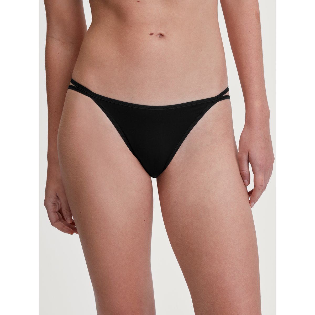 Tanga taille basse Polyamide SLEEK SKIN noir, CALIDA