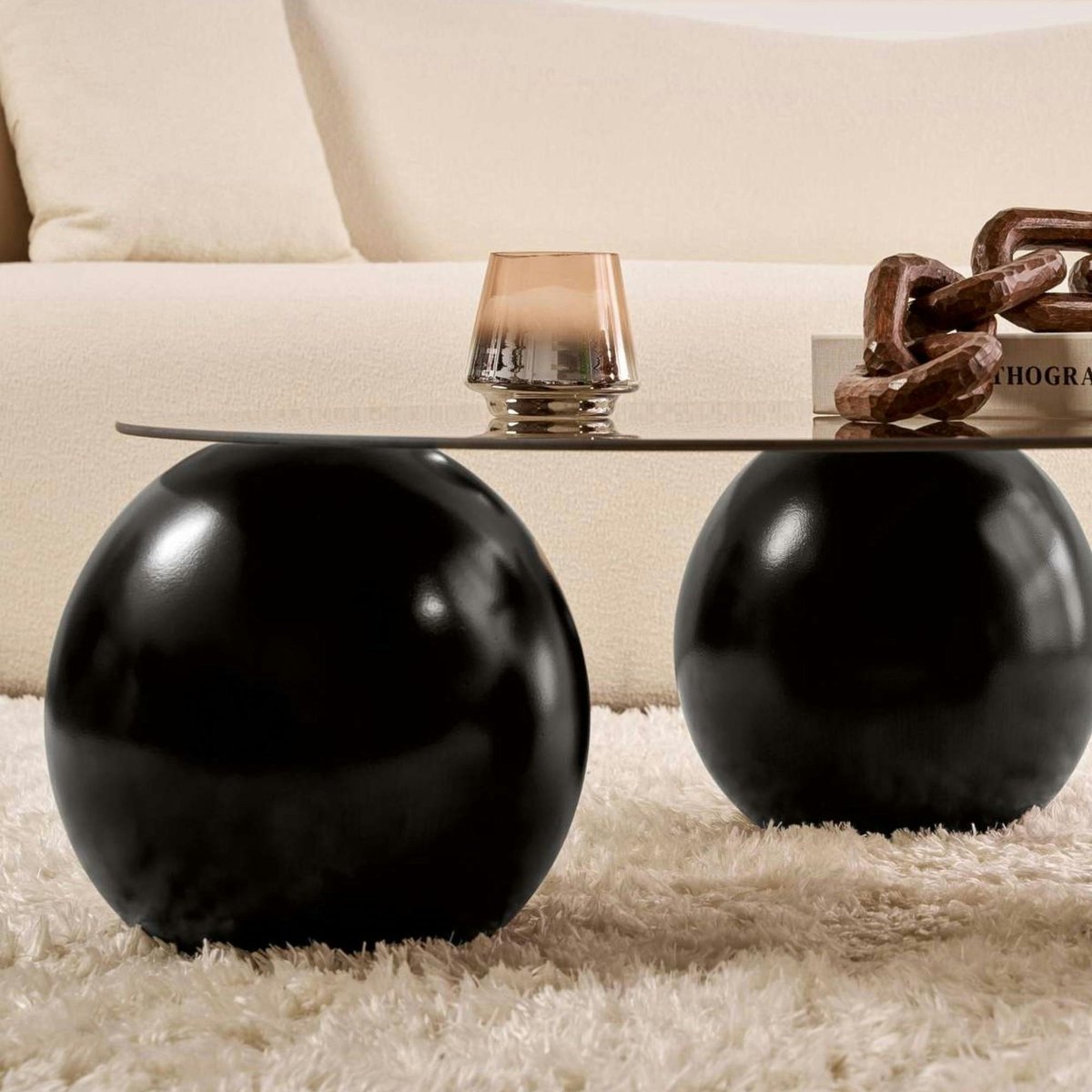Table basse ronde en verre pieds boules KOCHI verre ambré - pieds noirs, PIER IMPORT