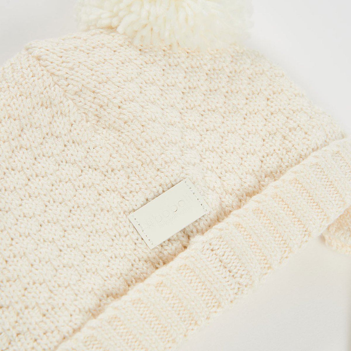 Bonnet bébé avec pompons blanc, BOBOLI