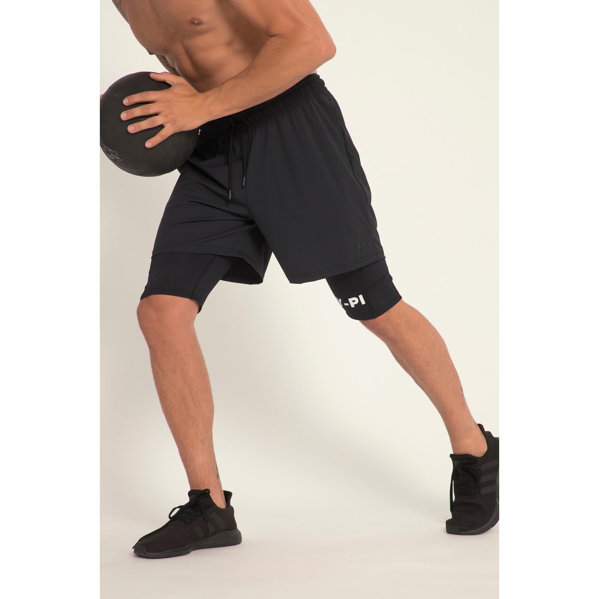 Short de sport FLEXNAMIC® noir, JP1880
