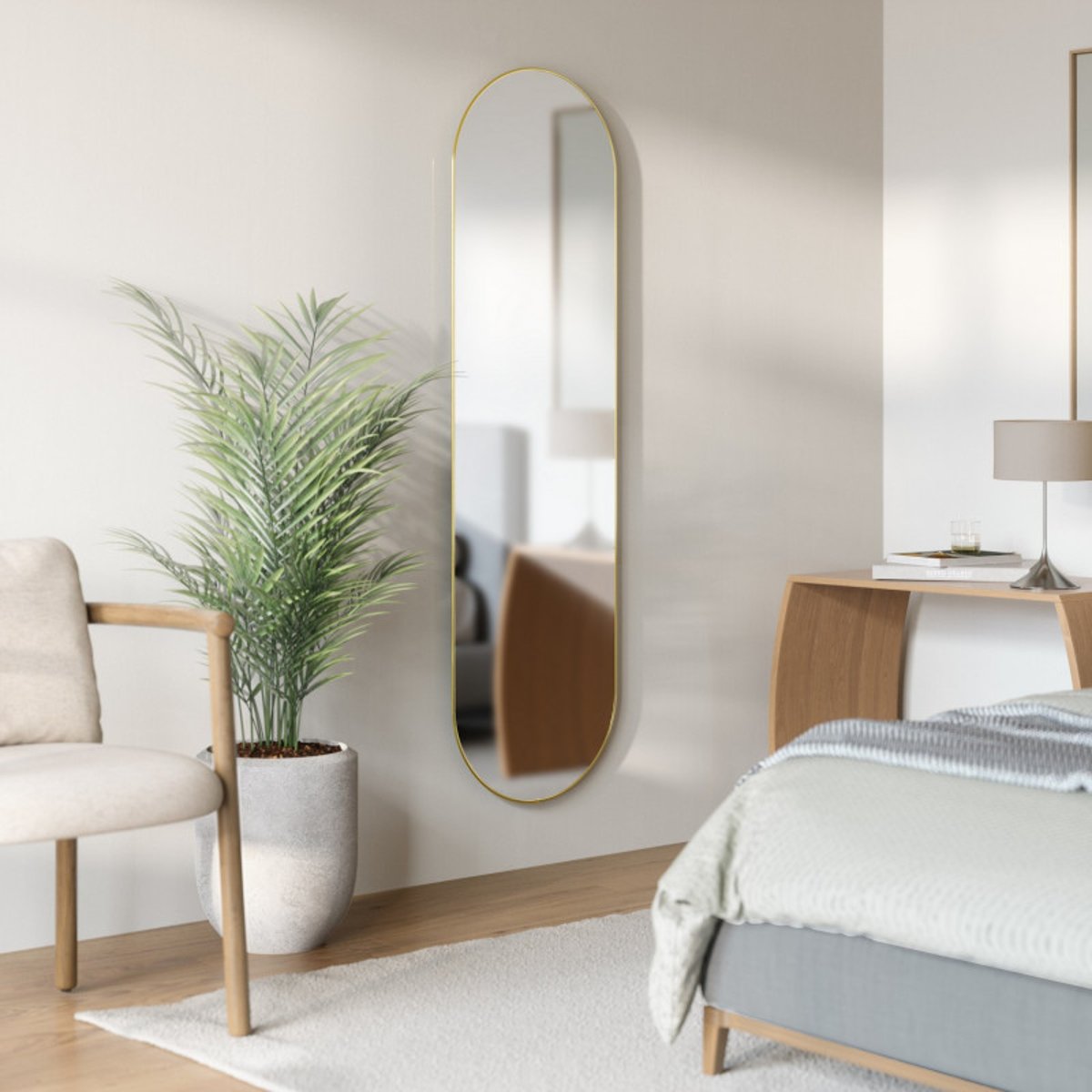 Grand miroir mural ovale métal HUBBA PILL laiton, UMBRA