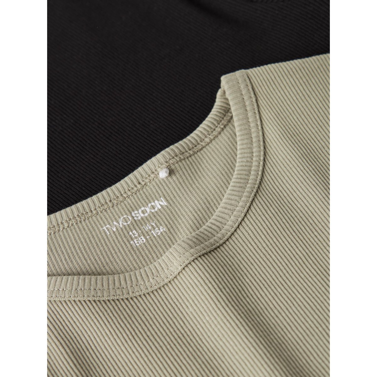 Top black, TWO SOON