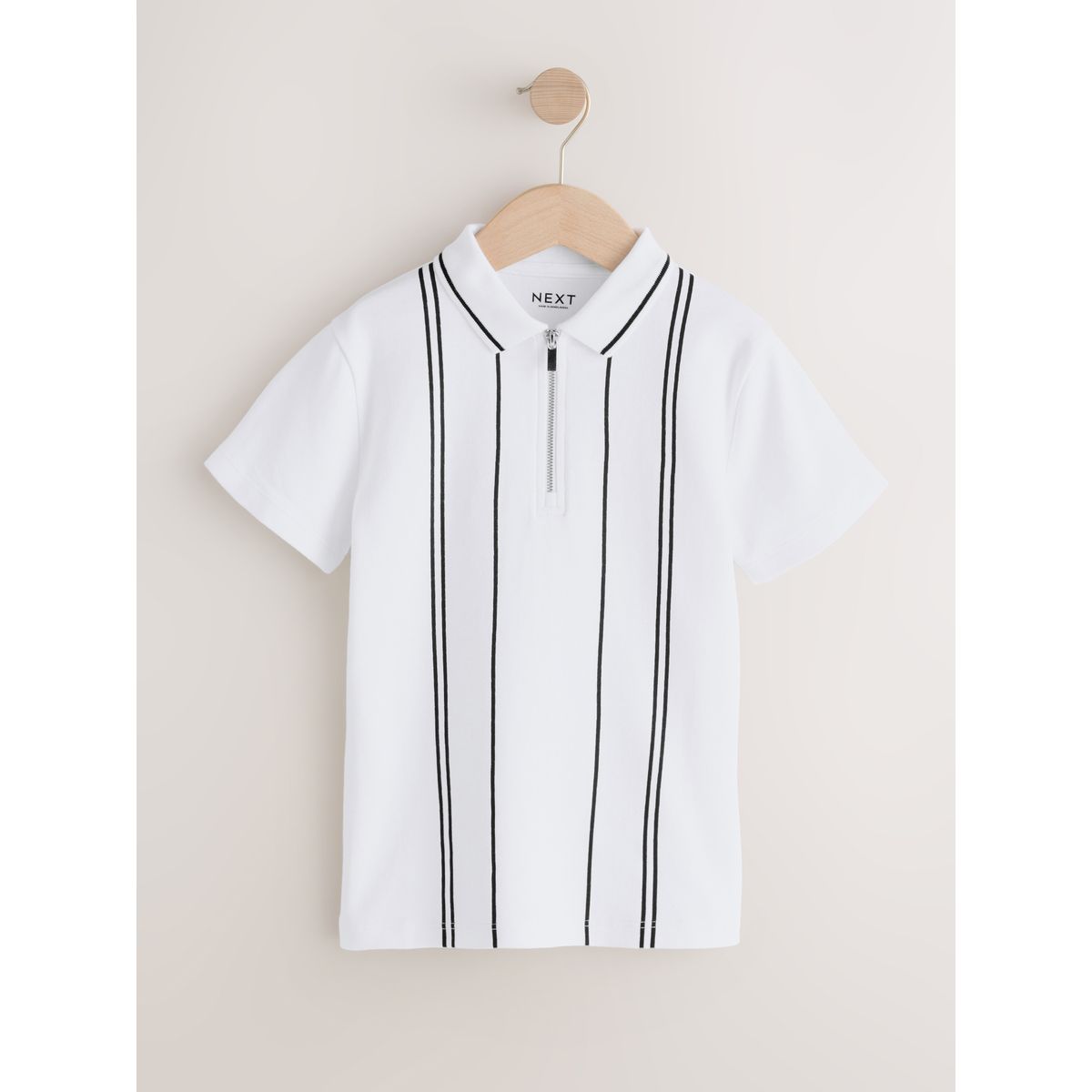 Polo à col zippé et rayures verticales blanc/noir, NEXT
