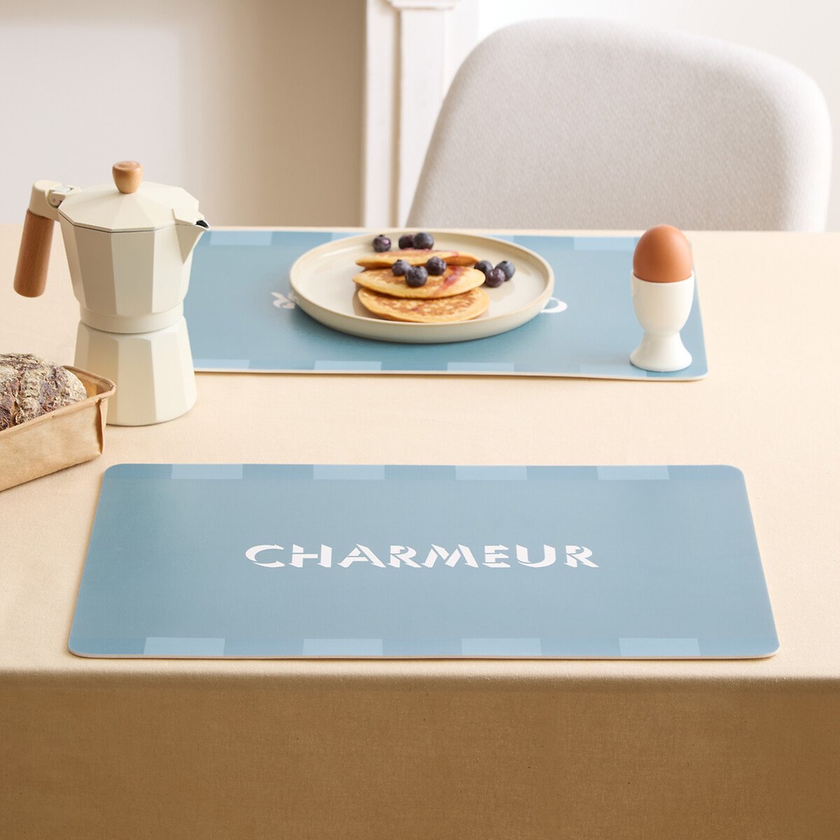 Set de table rectangulaire avec inscription charmeur bleu, ATMOSPHERA