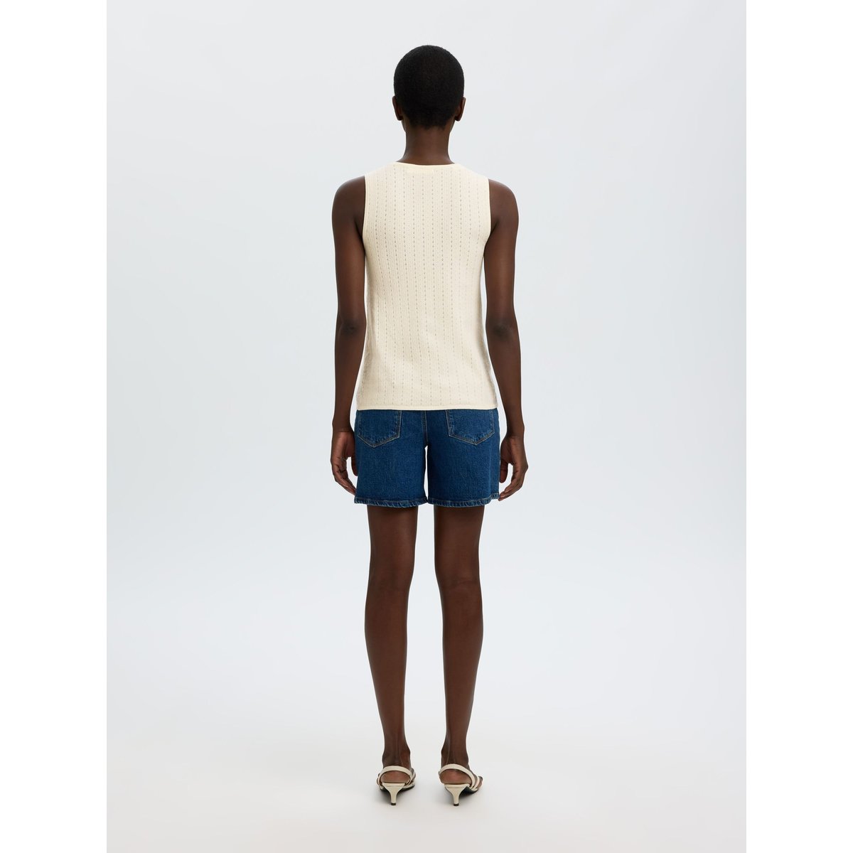 Top En Maille egret, SELECTED