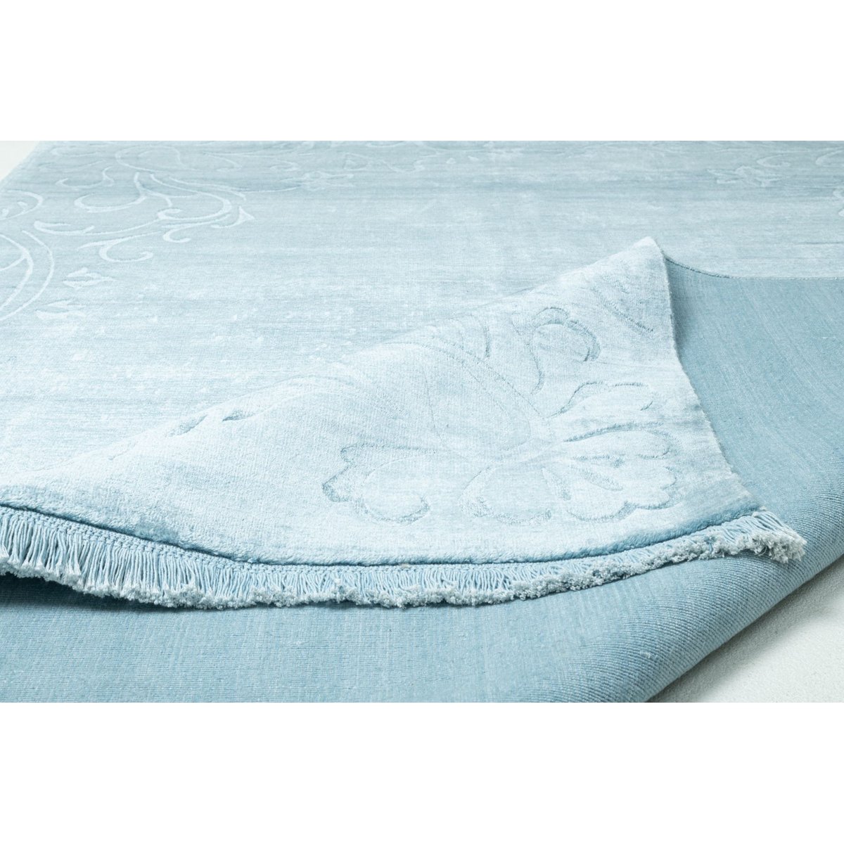 Tapis salon Ewa, noué main, à franges turquoise, THEKO
