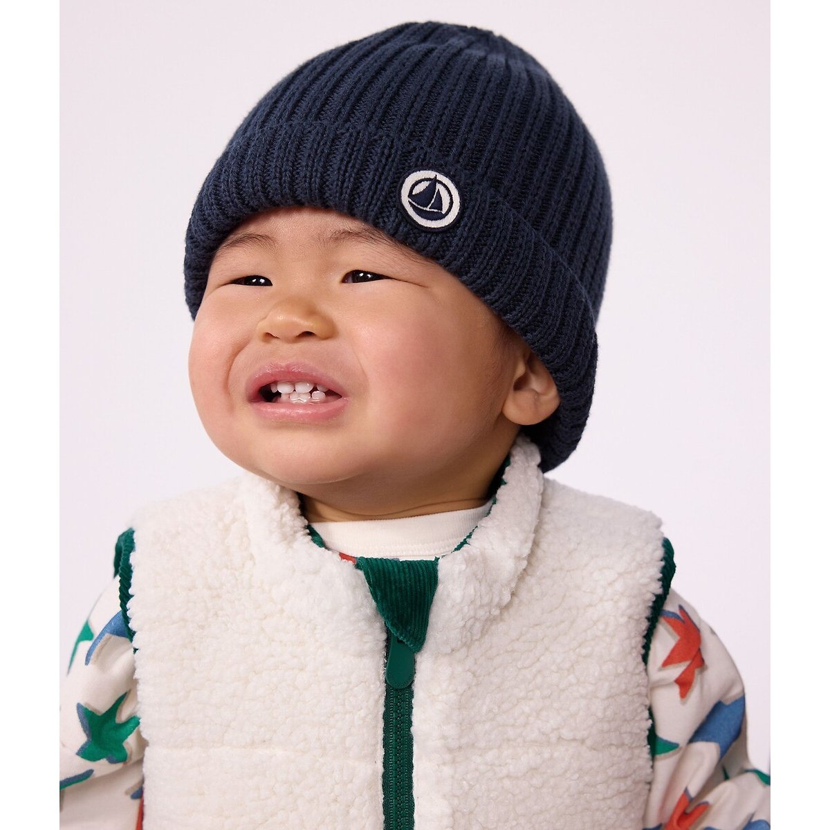 Bonnet bébé uni en tricot doublé polaire bleu marine, PETIT BATEAU