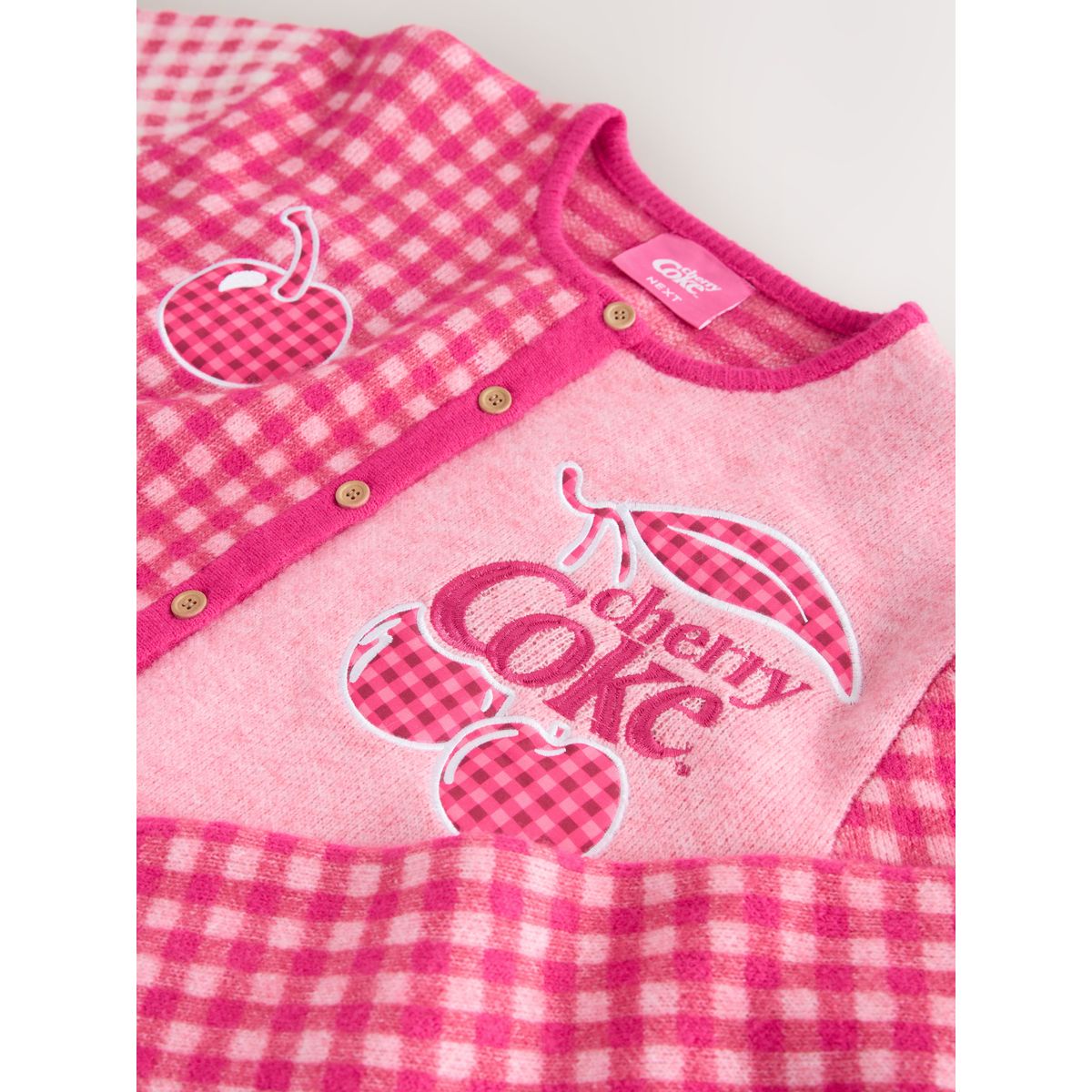 Cardigan en maille ras du cou coca-cola cerise à carreaux roses, NEXT