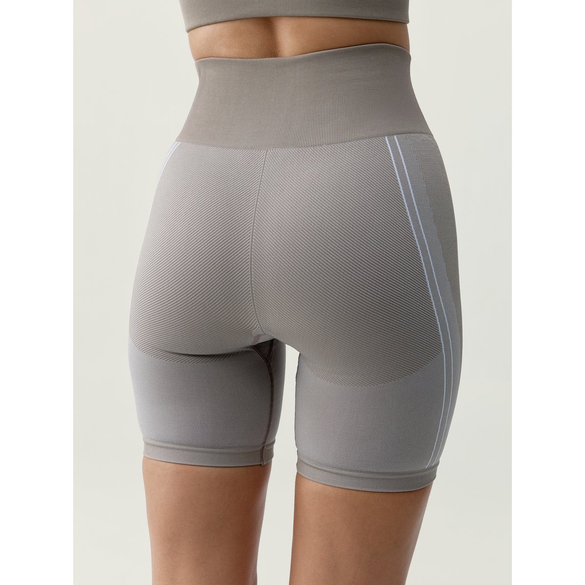 Short de sport femme Cara type cycliste beige/blanc, BORN