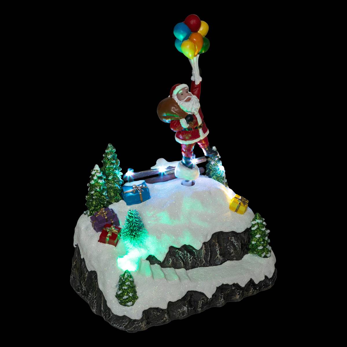 Village lumineux Père Noël et ballons 6 LED H22,5 cm à mouvement multicolore, FEERIC LIGHTS & CHRISTMAS