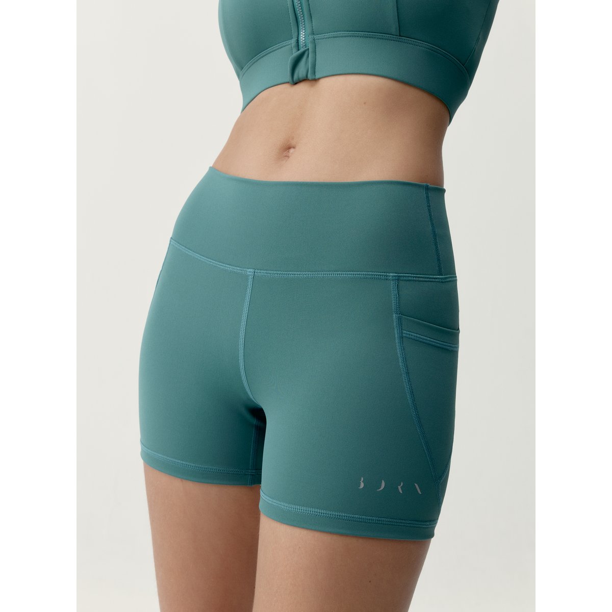Short de sport femme Eider Avec poches bleu sarcelle, BORN