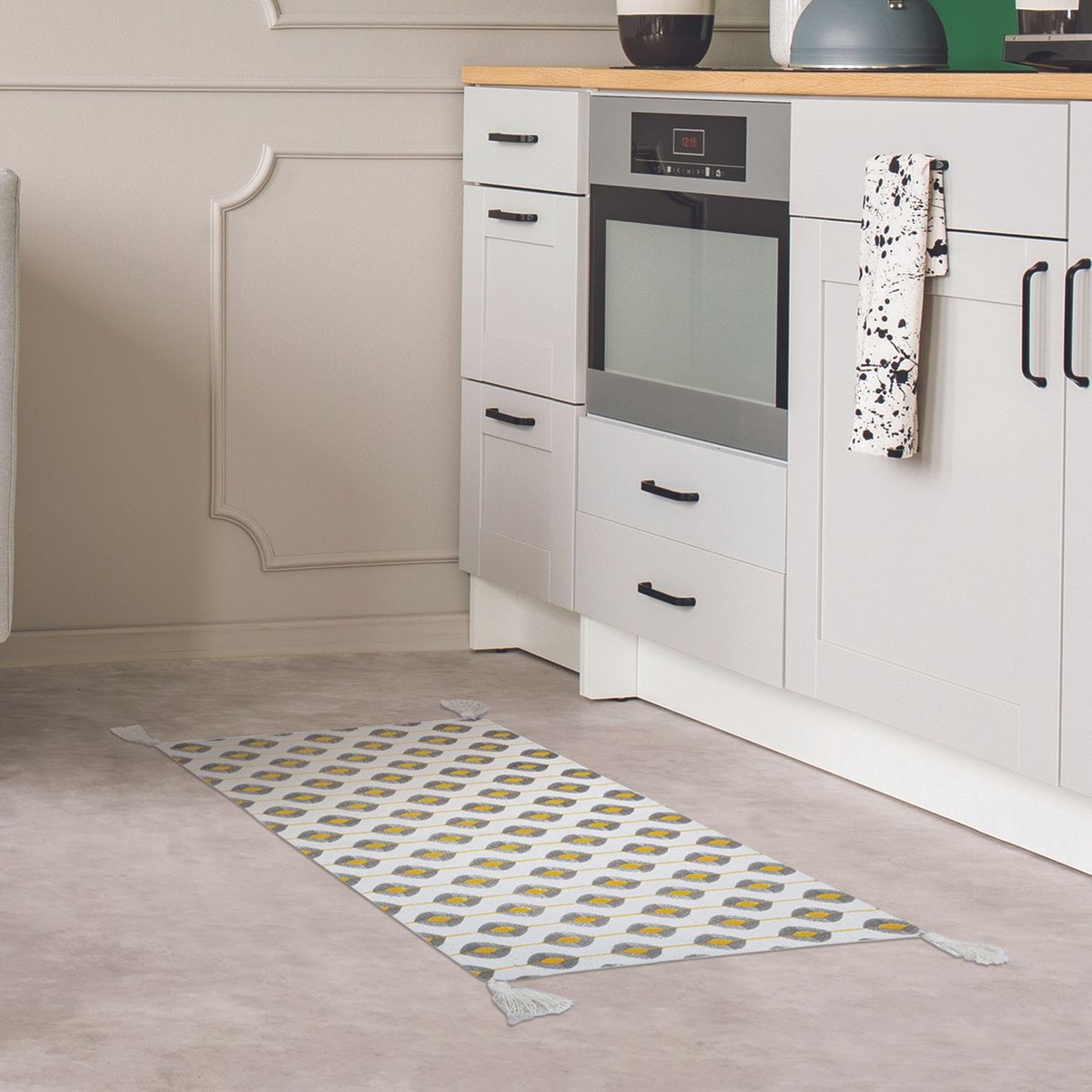 Tapis à pompons à motifs ZESTE jaune, THE HOME DECO FACTORY