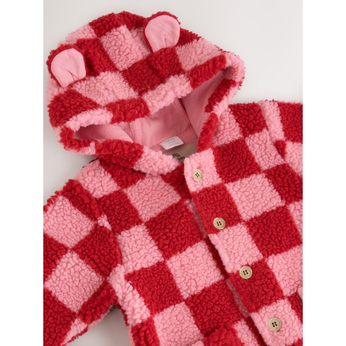 Combinaison à capuche pour bébé en borgana damier rose et rouge, NEXT