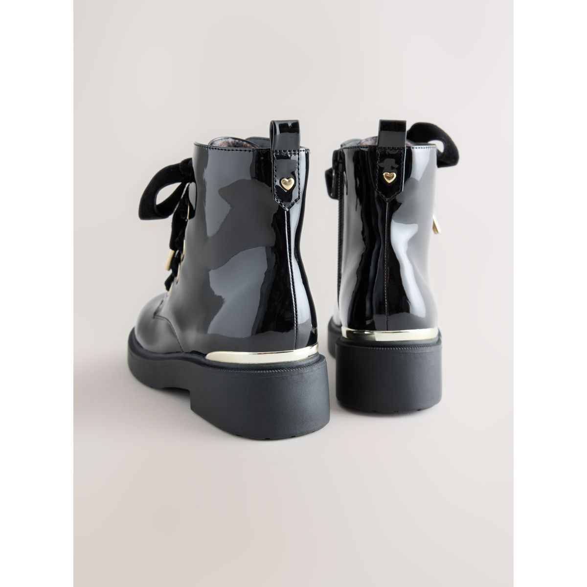 Bottines à nœud noir, NEXT