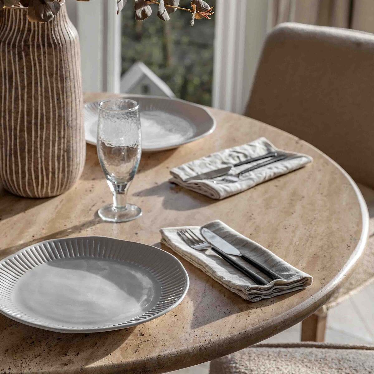 Sanford Round Travertine & Mango Dining Table dark wood, ÉDITÉ