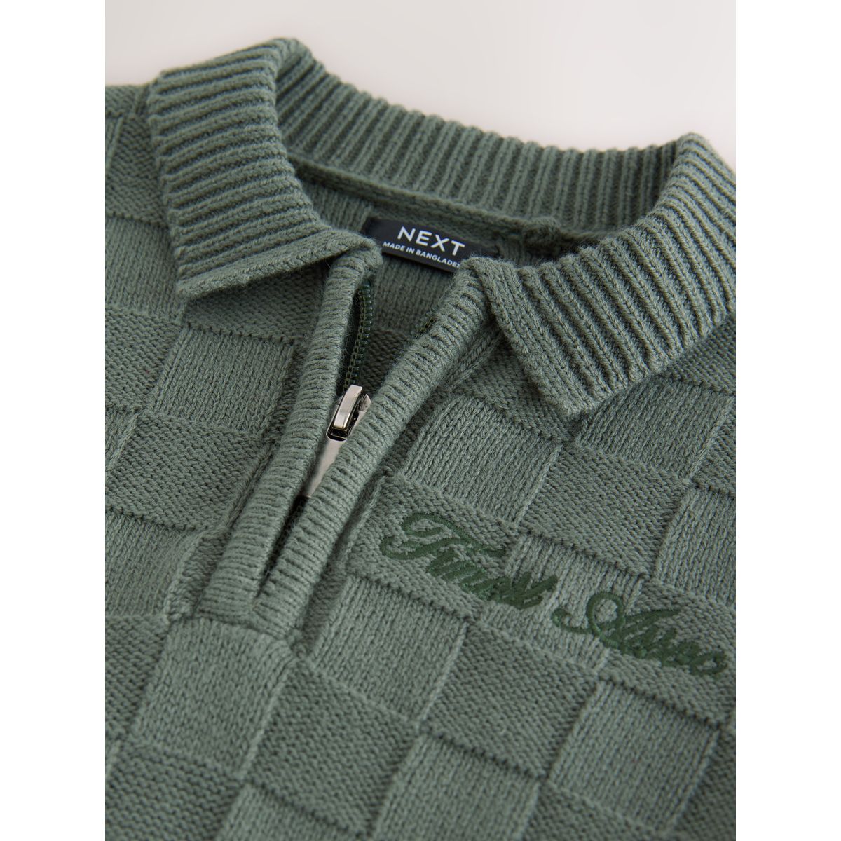 Polo en maille texturée à col zippé vert, NEXT