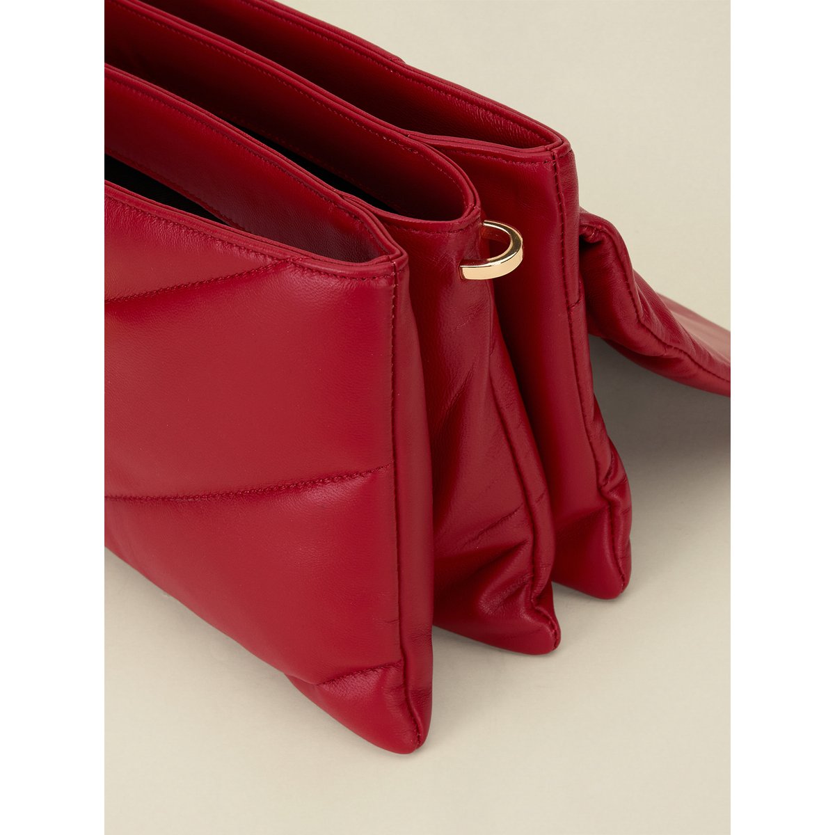 Sac matelassé rouge, OLTRE