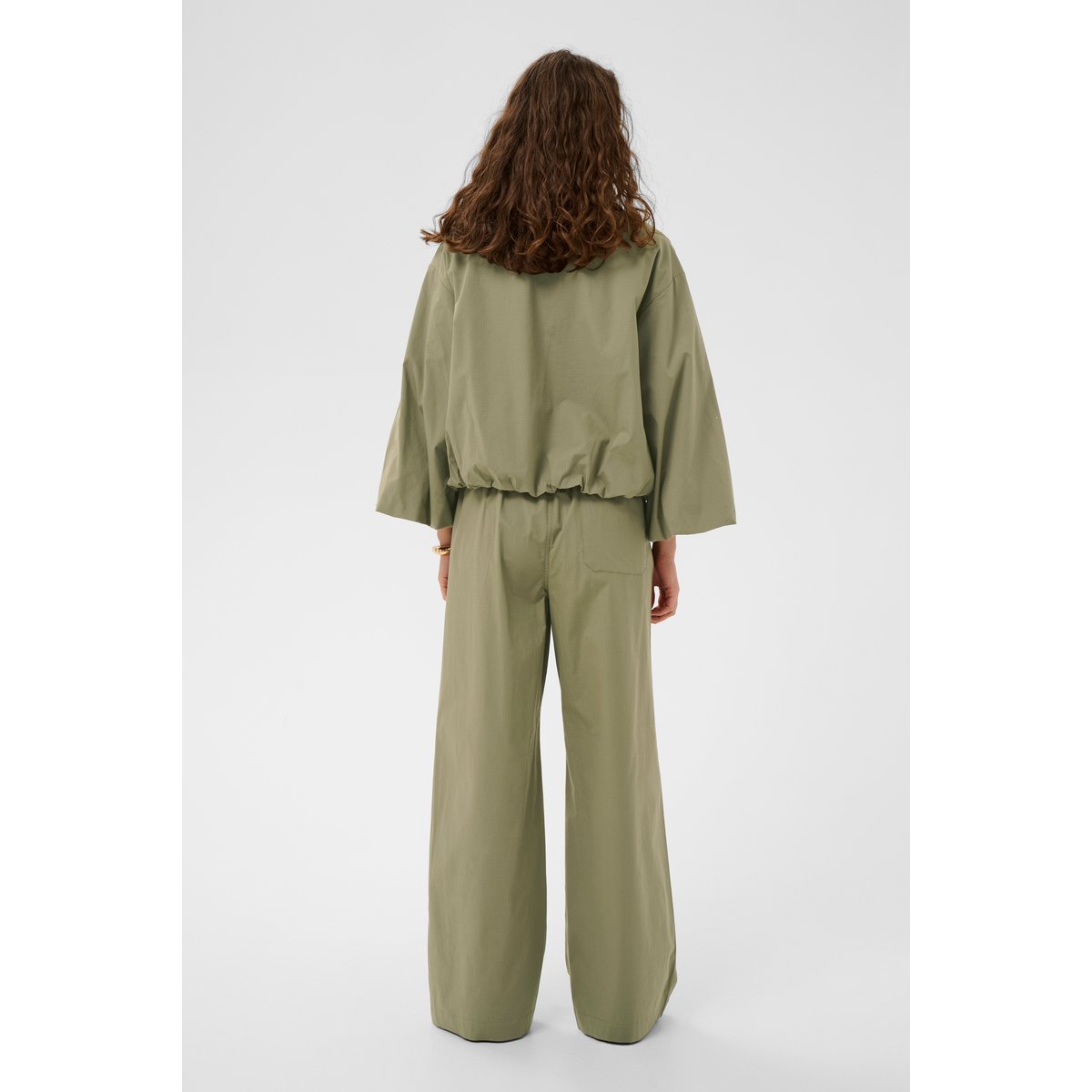 Manteau vert dusky green, CULTURE