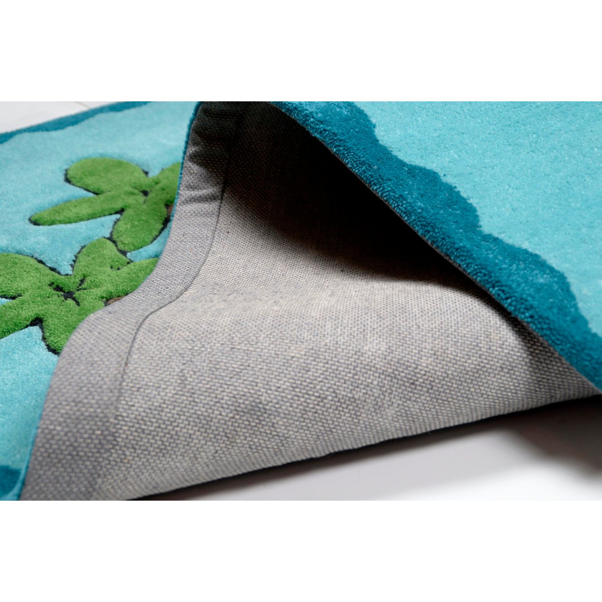 Tapis enfant Maui, la fillette de l'île, tufté turquoise, THEKO