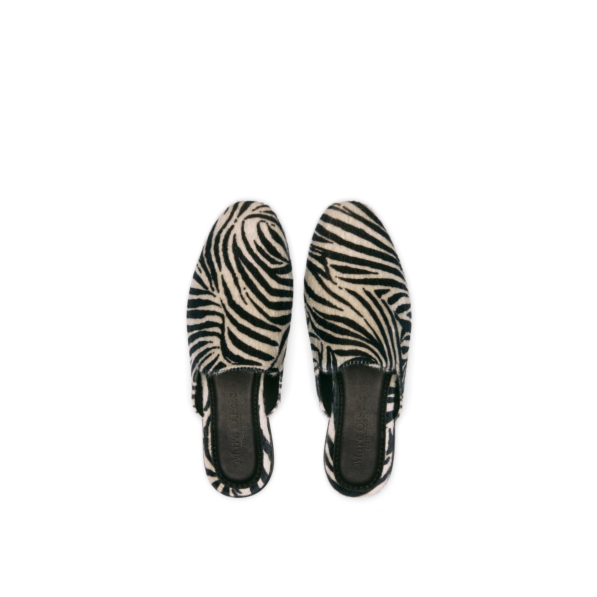 Mule modèle Safina en aspect peau de zèbre blanc/noir, MARC O'POLO
