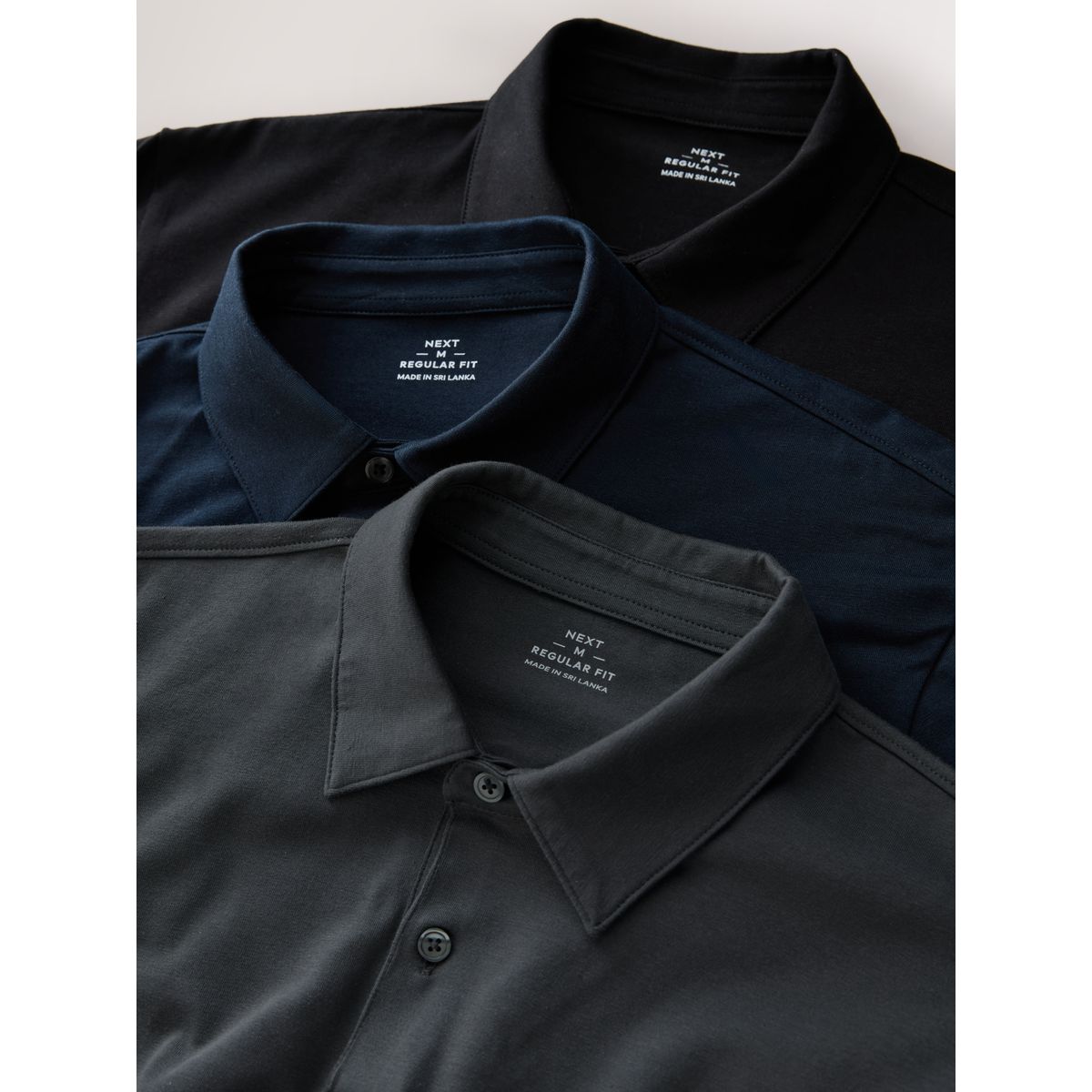 Polo motionflex à manches courtes, lot de 3 noir/gris/bleu marine, NEXT