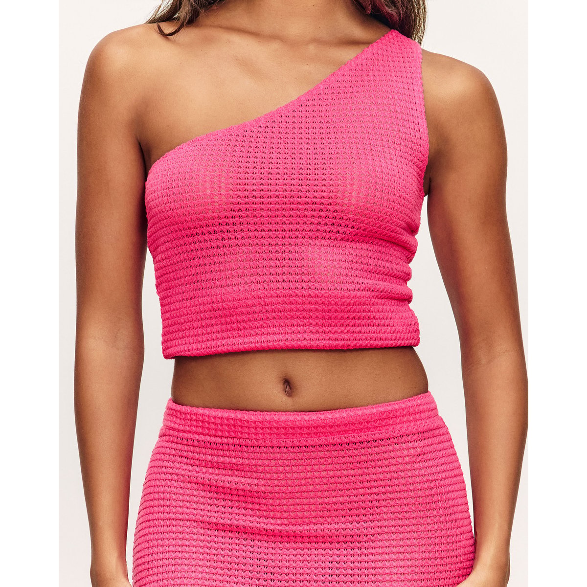 Top asymétrique en crochet TEHERIZ rose, UNDIZ