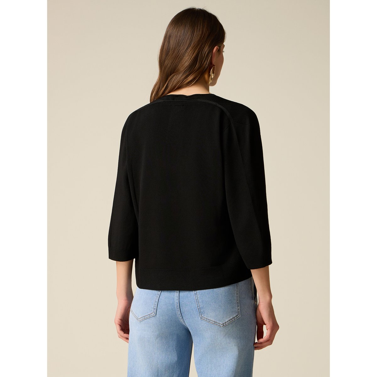 Cardigan noir, OLTRE