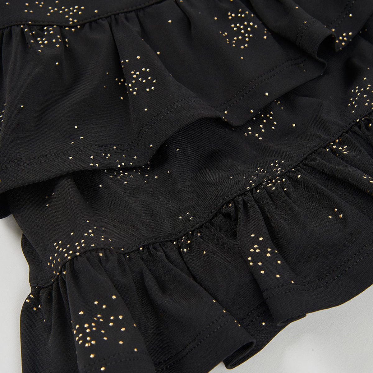 Jupe fille en maille imprimée avec étoiles et volants noir, BOBOLI