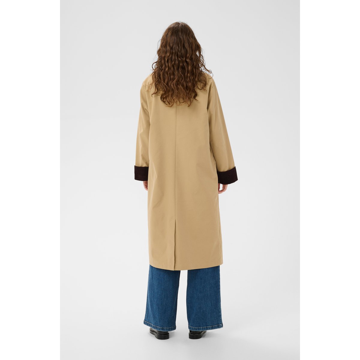 Manteau beige, CULTURE