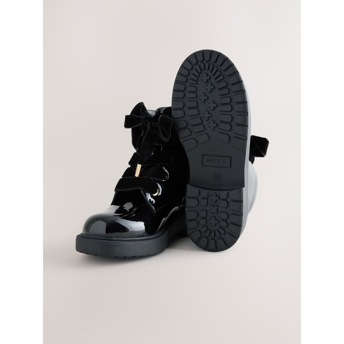 Bottines à nœud noir, NEXT