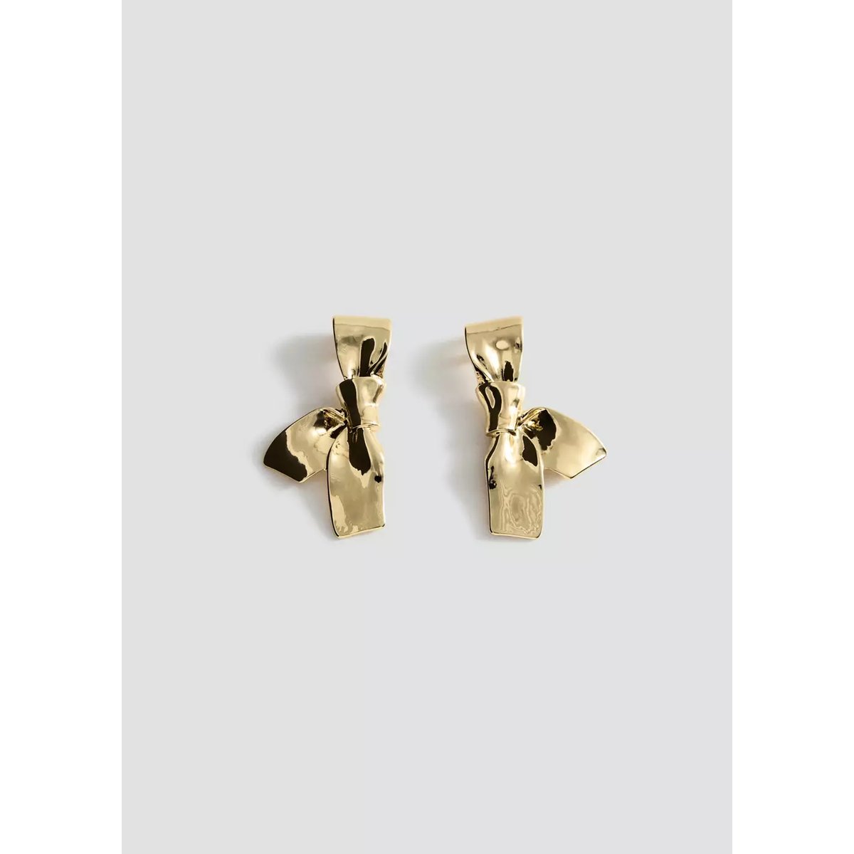 Boucles d'oreilles métallisées en forme de nœud or, MANGO