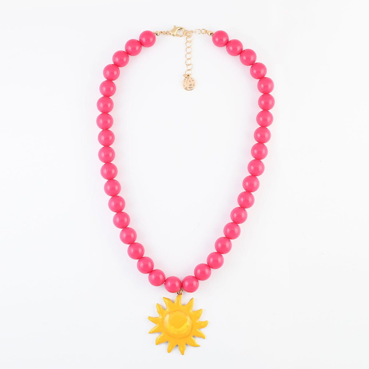 Collier de perles rose fuchsia pendentif soleil fuchsia, BALABOOSTE
