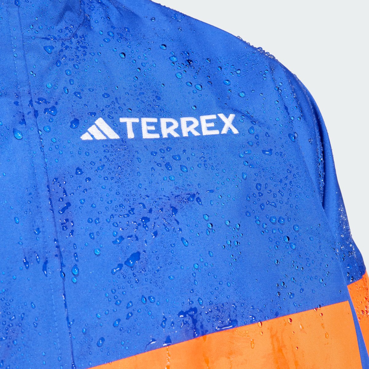 Anorak Terrex Xploric 2.5L Climaproof semi lucid blue / semi impact orange / pure ruby, adidas Performance
