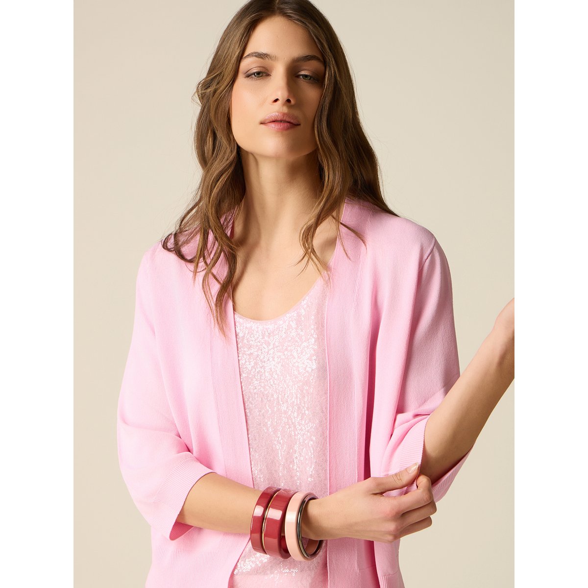 Cardigan rose, OLTRE