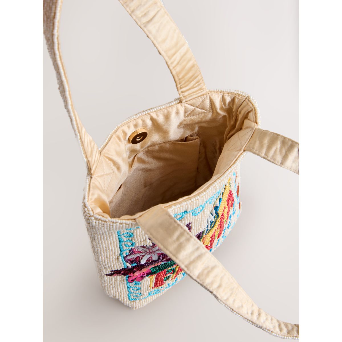 Mini sac à main orné fanta sous licence crème, NEXT