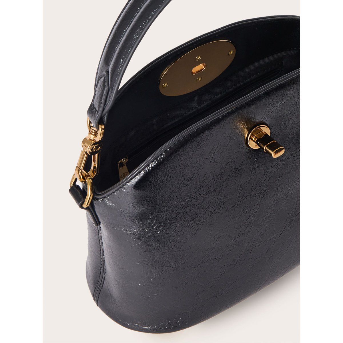 Mini sac ovale noir, MOTIVI