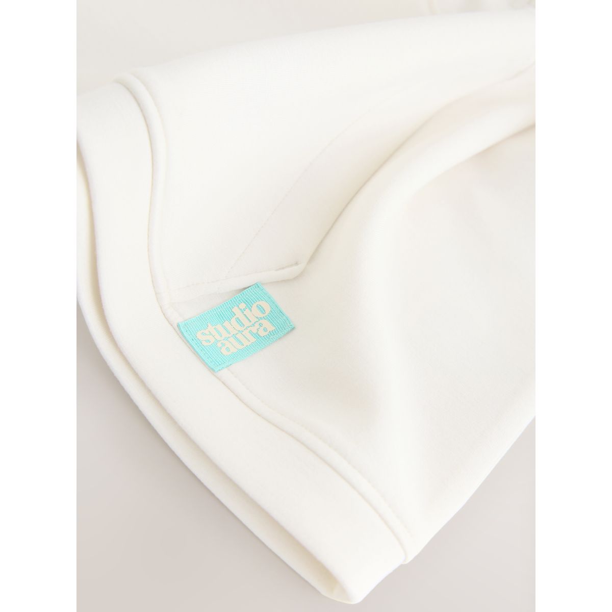 Ensemble haut à col zippé et pantalon évasé crème/naturel, NEXT