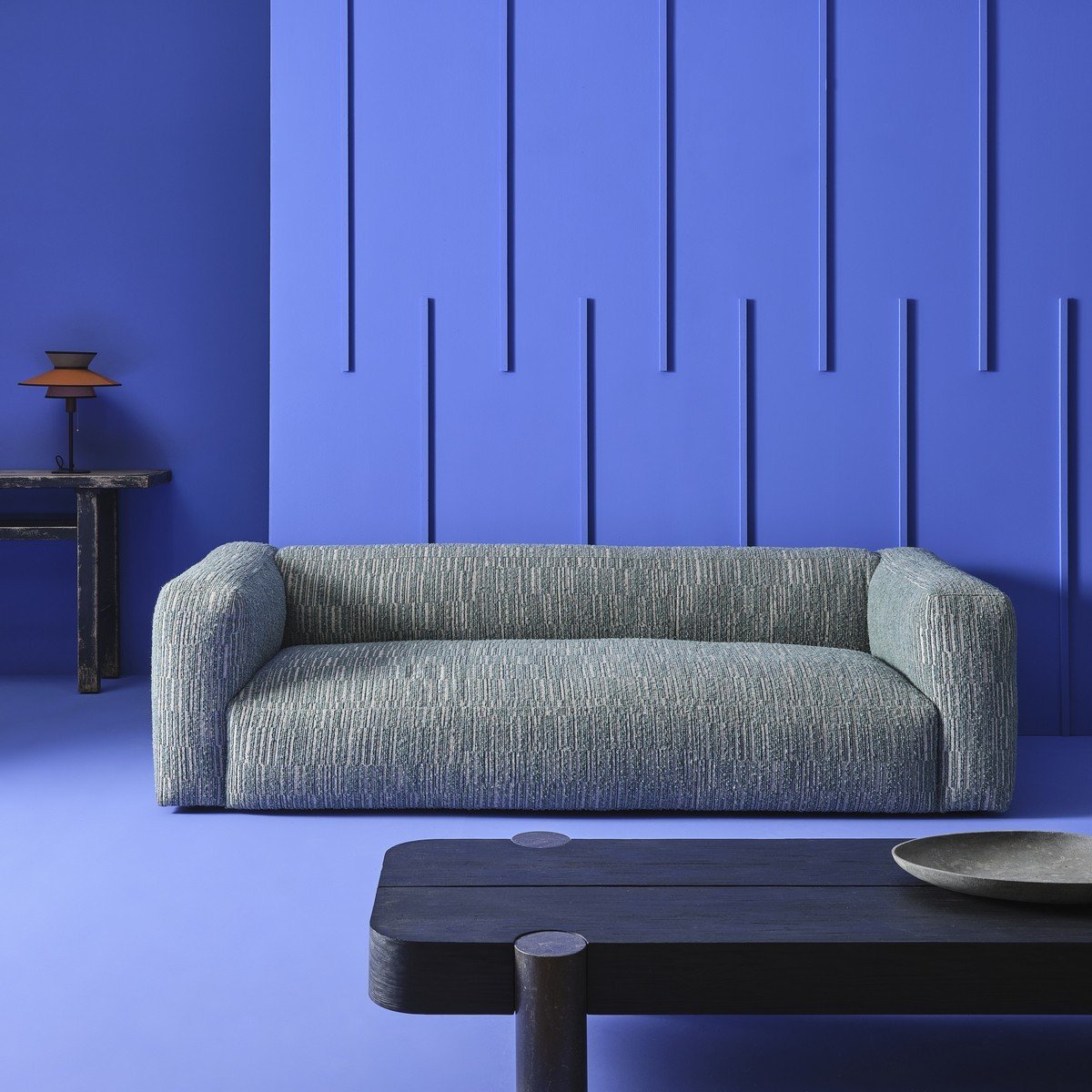Quelles couleurs subliment un canapé vert foncé ? Nos idées faciles