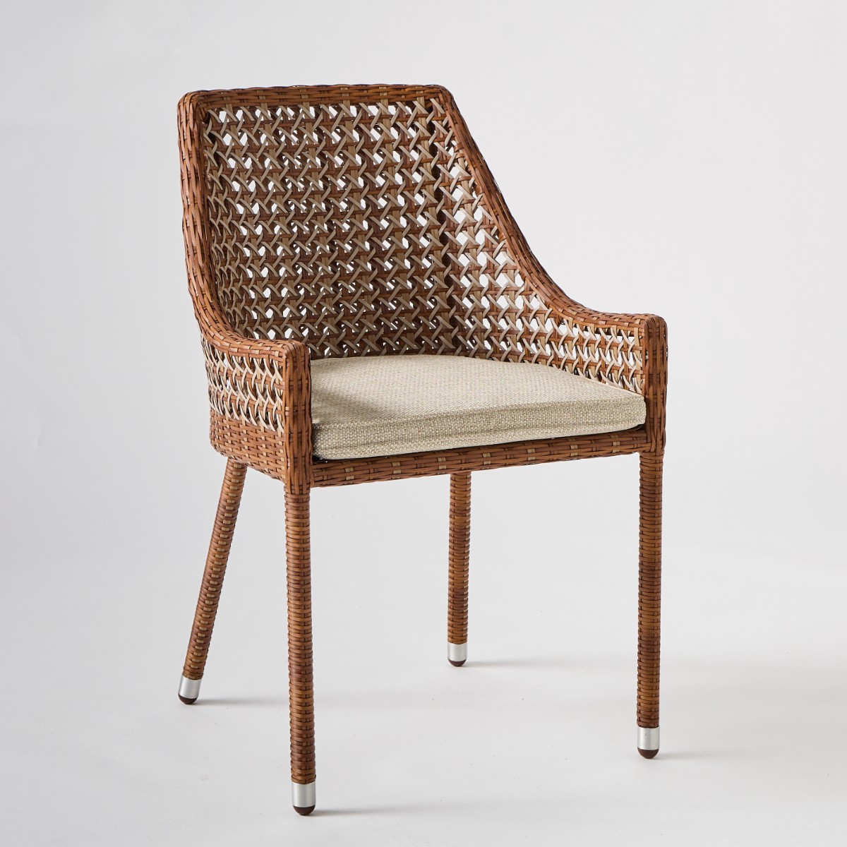 Fauteuil de table en résine tressée ANTIBES LATERITE rotin teinté "miel", KOK