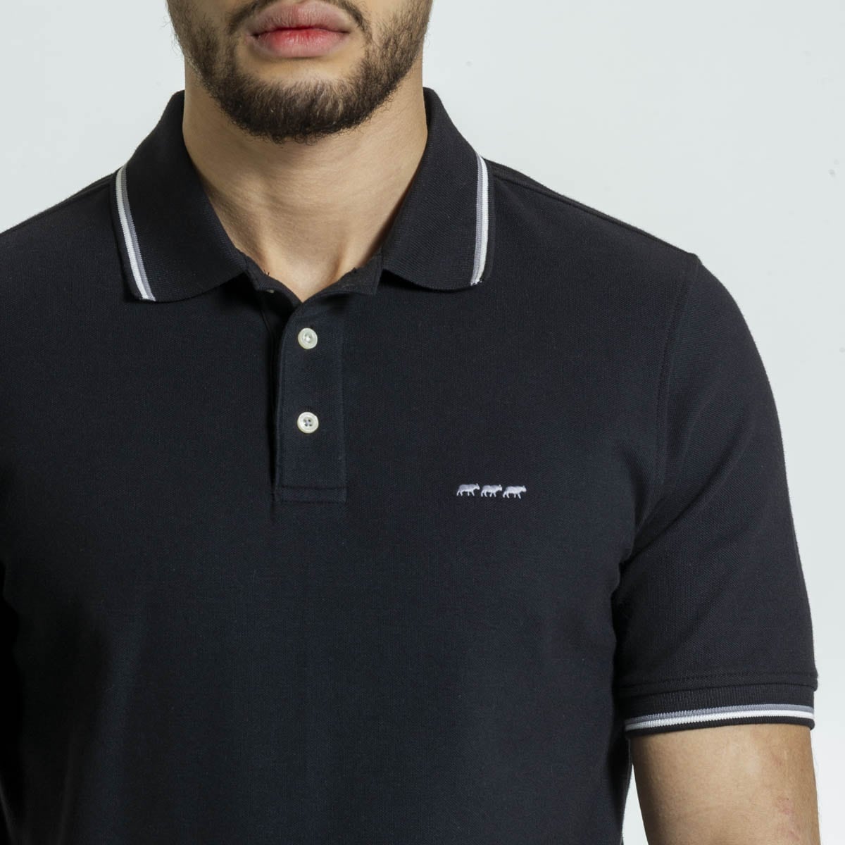 Polo alban noir, MISE AU GREEN