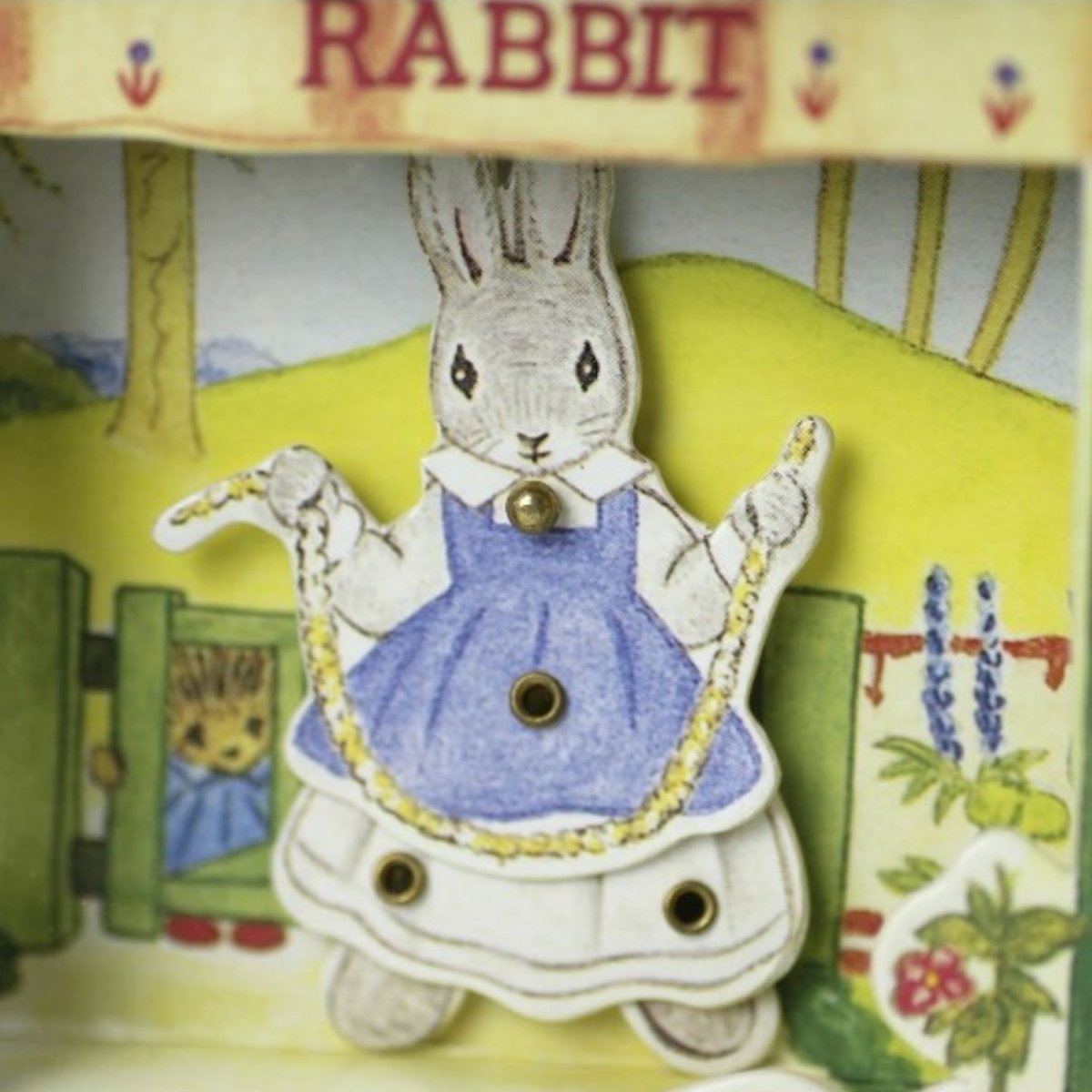 Mini dancing musical Little grey rabbit bleu, ecru, vert et orange, TROUSSELIER