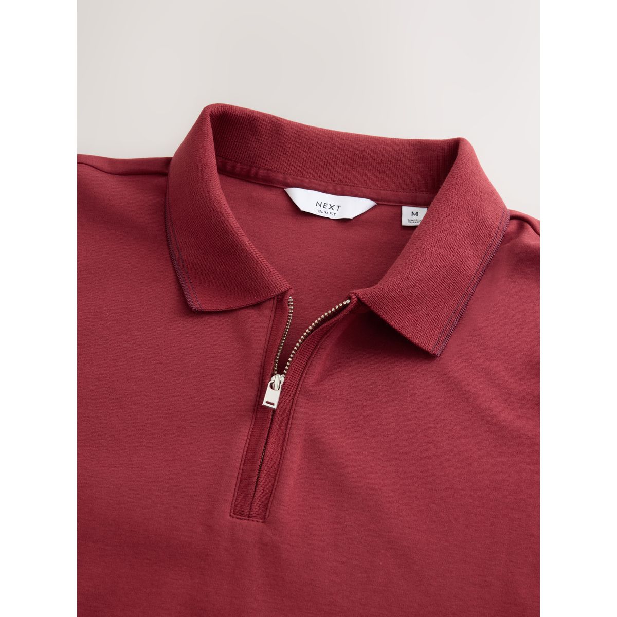 Polo à col zippé et liseré ton sur rouge, NEXT