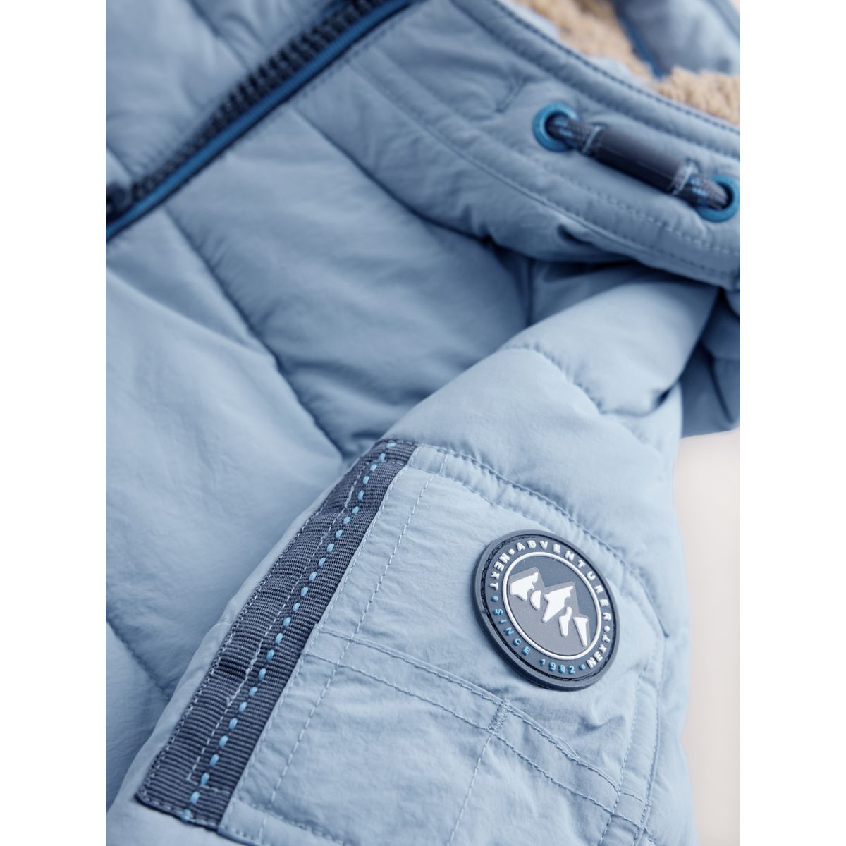 Manteau rembourré à doublure peau lainée bleu clair, NEXT