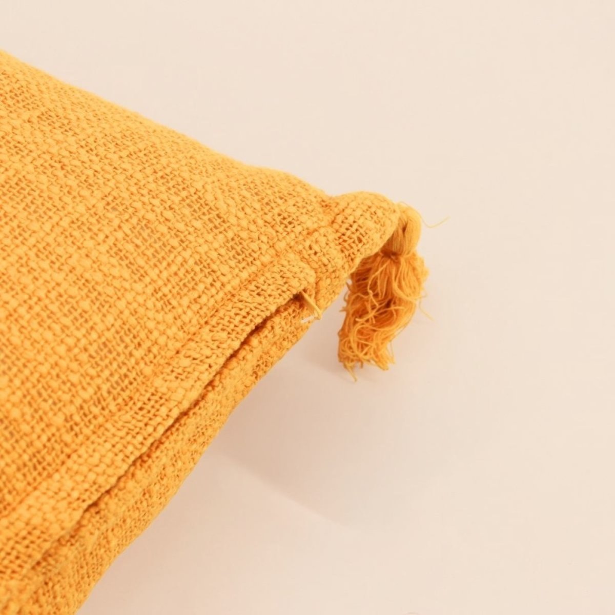 Coussin avec pompons 30x50cm orange, ORNAMI