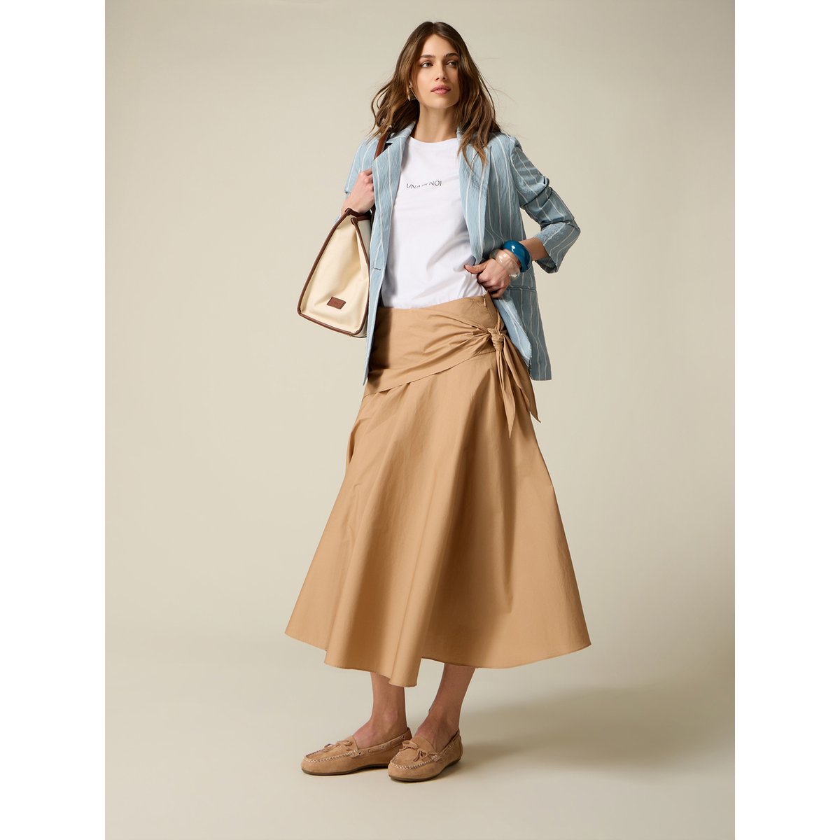 Jupe trapèze avec nœud beige, OLTRE