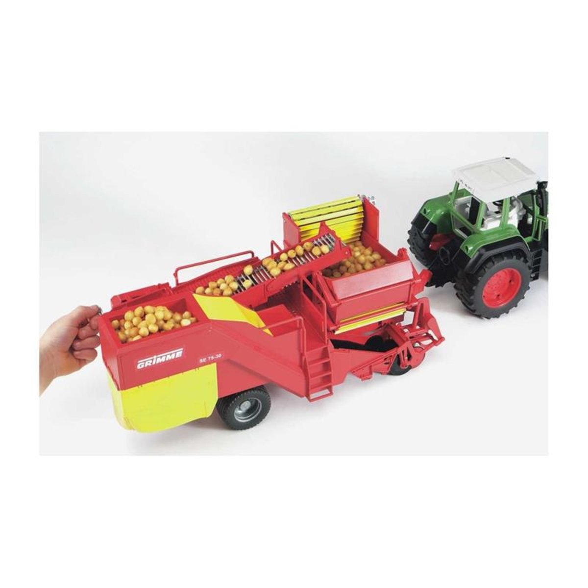 Arracheuse de pommes de terre Grimme SE 75-30 avec pommes de terre rouge et jaune, BRUDER