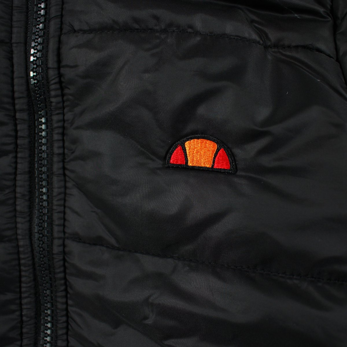 Manteau noir, ELLESSE