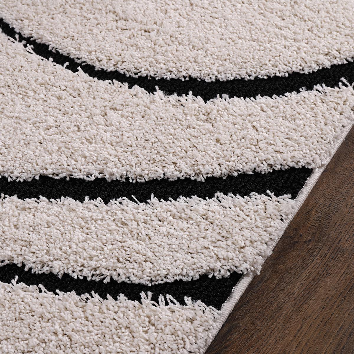 Tapis rond shaggy tissé motif géométrique POUDA crème, noir, UN AMOUR DE TAPIS