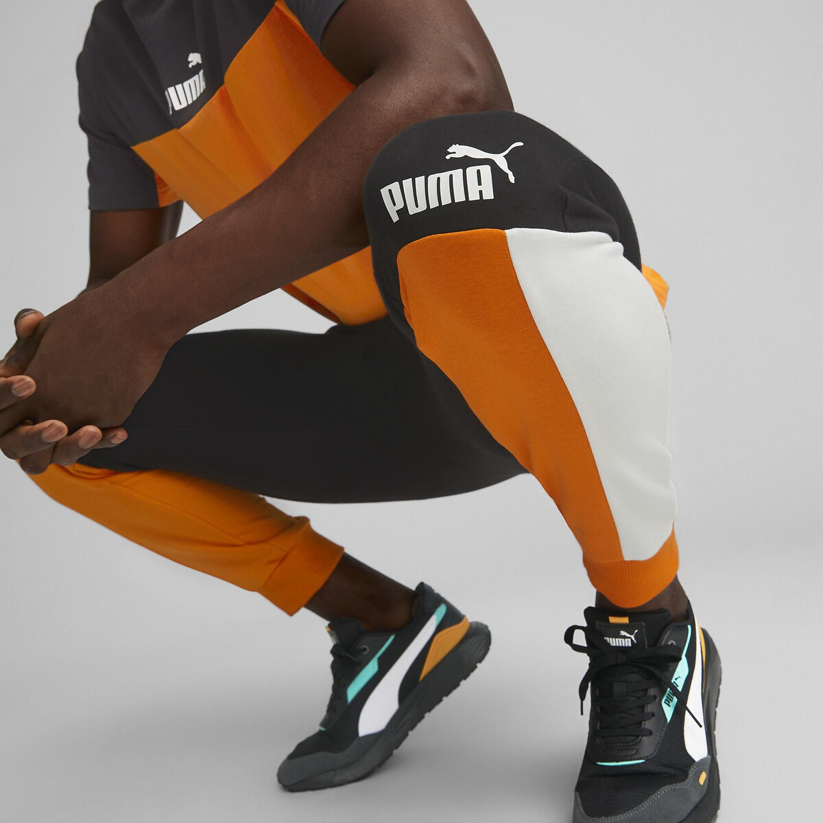 Pantalon de survêtement Colorblock noir/orange, PUMA