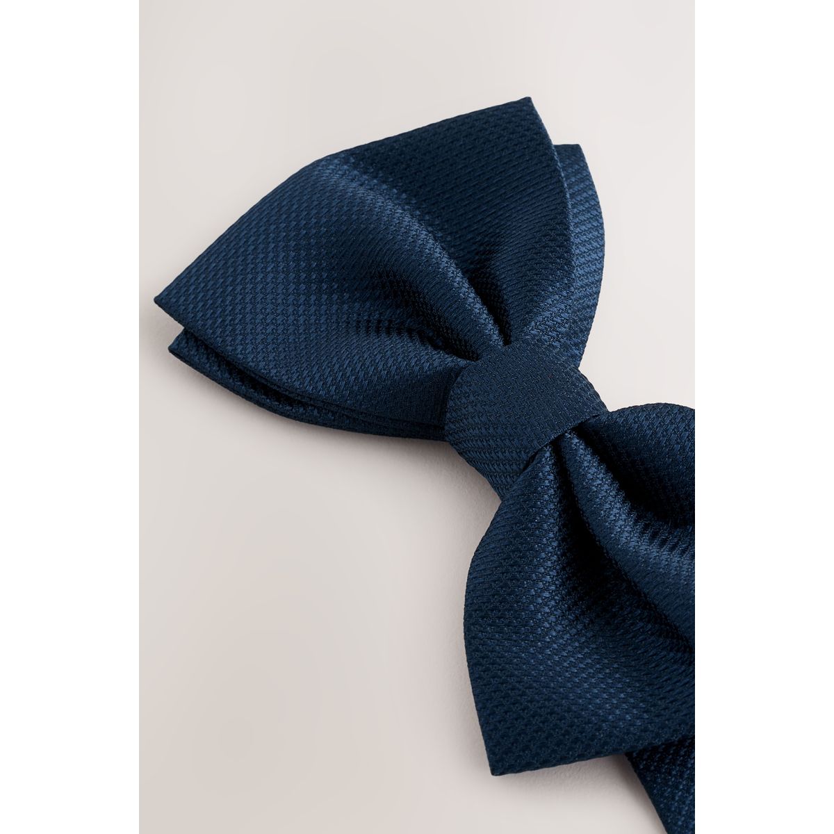 Nœud papillon bleu marine, NEXT